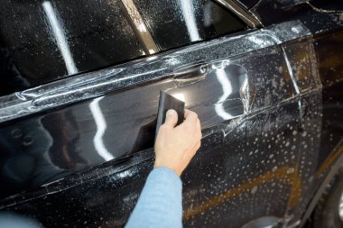 Filming car body at the vehicle service