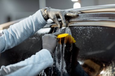 Filming car body at the vehicle service