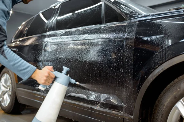 Preparing vehicle body before protective film apply — Stock Fotó
