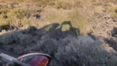 Car shadow on the roadside