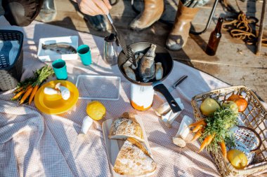 Picnic with fish and vegetables