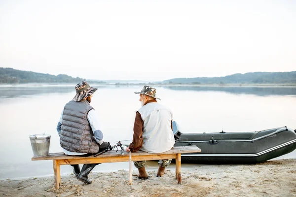 Grandfather with son fishing together — Stock Photo, Image