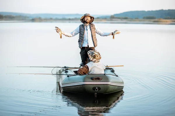 Grandfather with son fishing on the boat — Stok fotoğraf