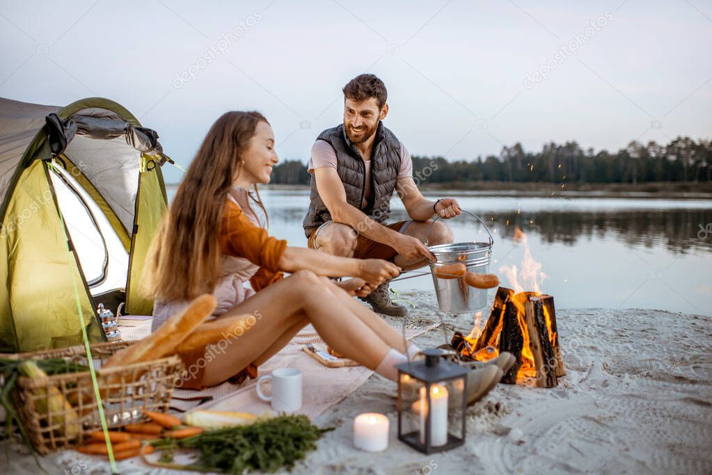 Couple at the campsite on the beach