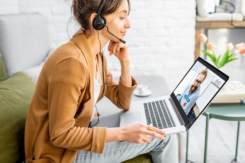 Business woman having a video call with coworker