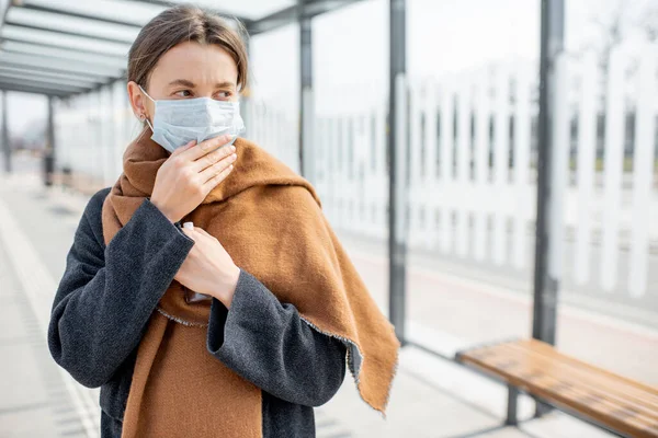 Woman with face mask during epidemic outdoors