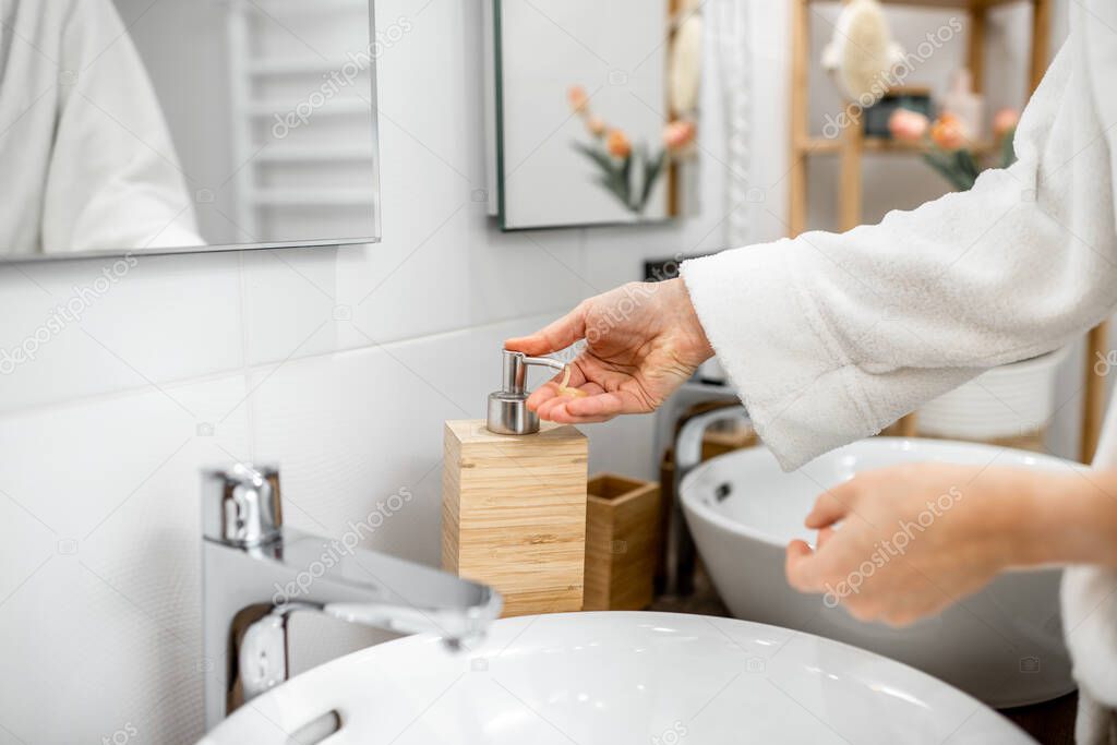 Woman washing hands, close-up