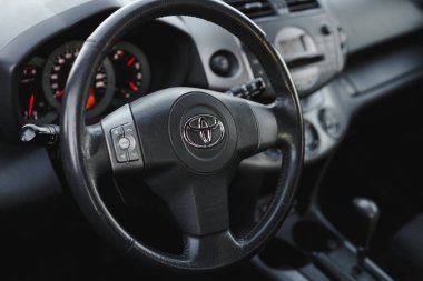 DNIPRO, UKRAINE - FEBRUARY 19, 2020: TOYOTA RAV4 2006 GREY COLOR, WHEEL CLOSE