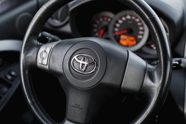 DNIPRO, UKRAINE - FEBRUARY 19, 2020: TOYOTA RAV4 2006 GREY COLOR, WHEEL CLOSE