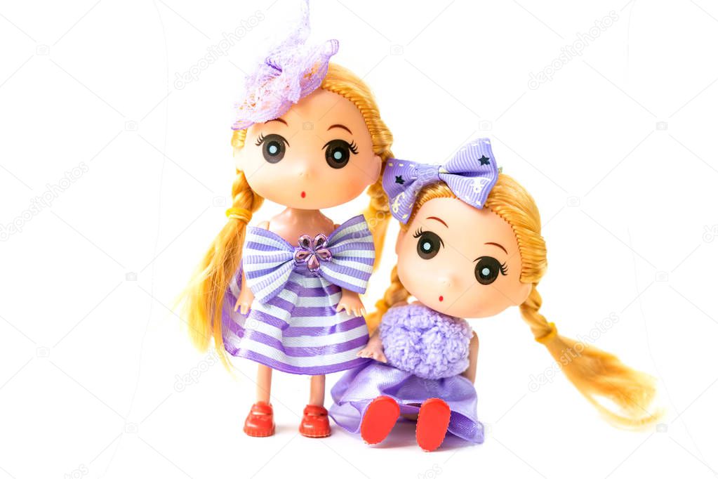 Dolls with Wearing a purple dress Blond hair on white background