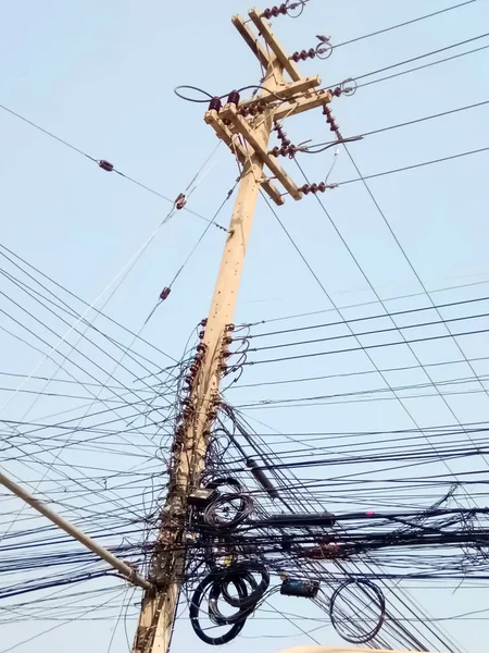 Messy wires and cables on Electric poles.