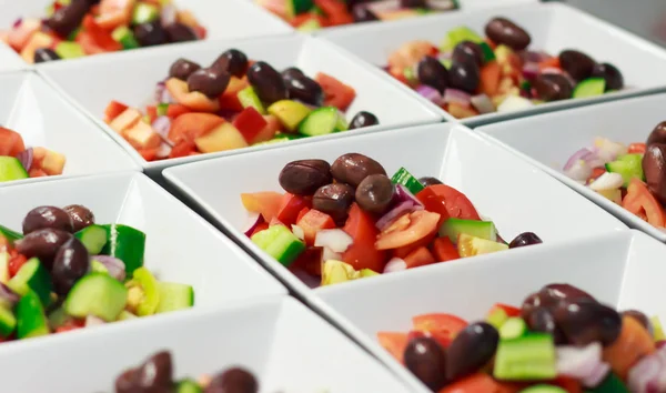 Entree Greek Salad prepared for catering — Stock Photo, Image