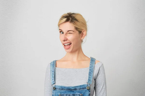 Indoor Shot Young Blonde Girl Perced Nose Wears Overalls Simply — Stock Photo, Image