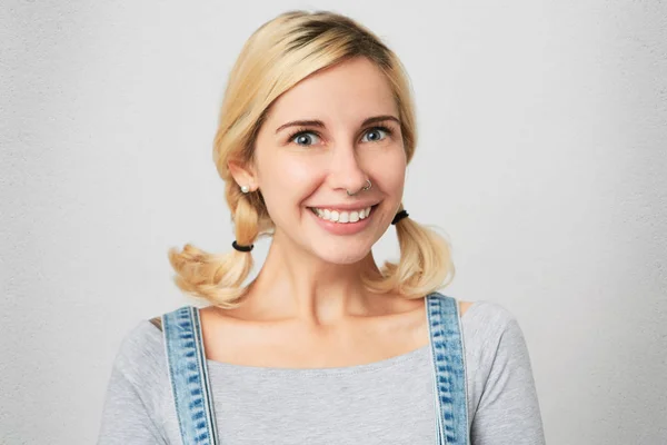 Indoor Shot Young Blonde Girl Perced Nose Wears Overalls Simply — Stock Photo, Image