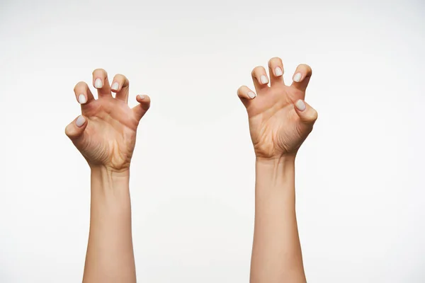 Die Erhobenen Hände Zweier Junger Frauen Mit Weißer Maniküre Imitieren — Stockfoto