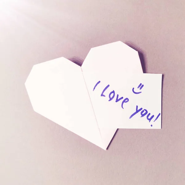 Pink paper heart with the note \