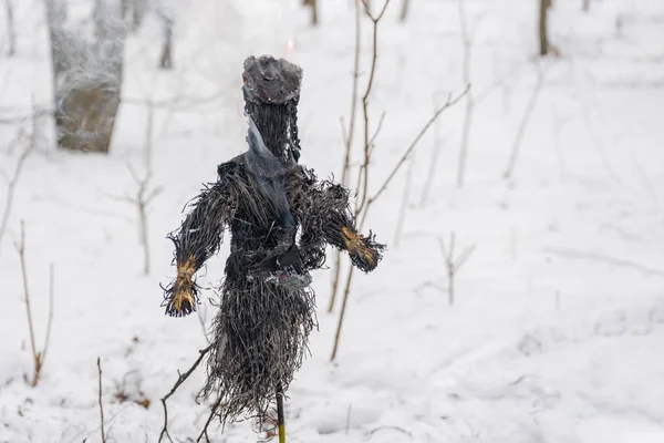 Russian holiday Maslenitsa. Traditional burning dolls of Shrovetide, winter farewell.