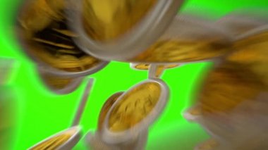 Bitcoins falling onto a green screen with motion blur