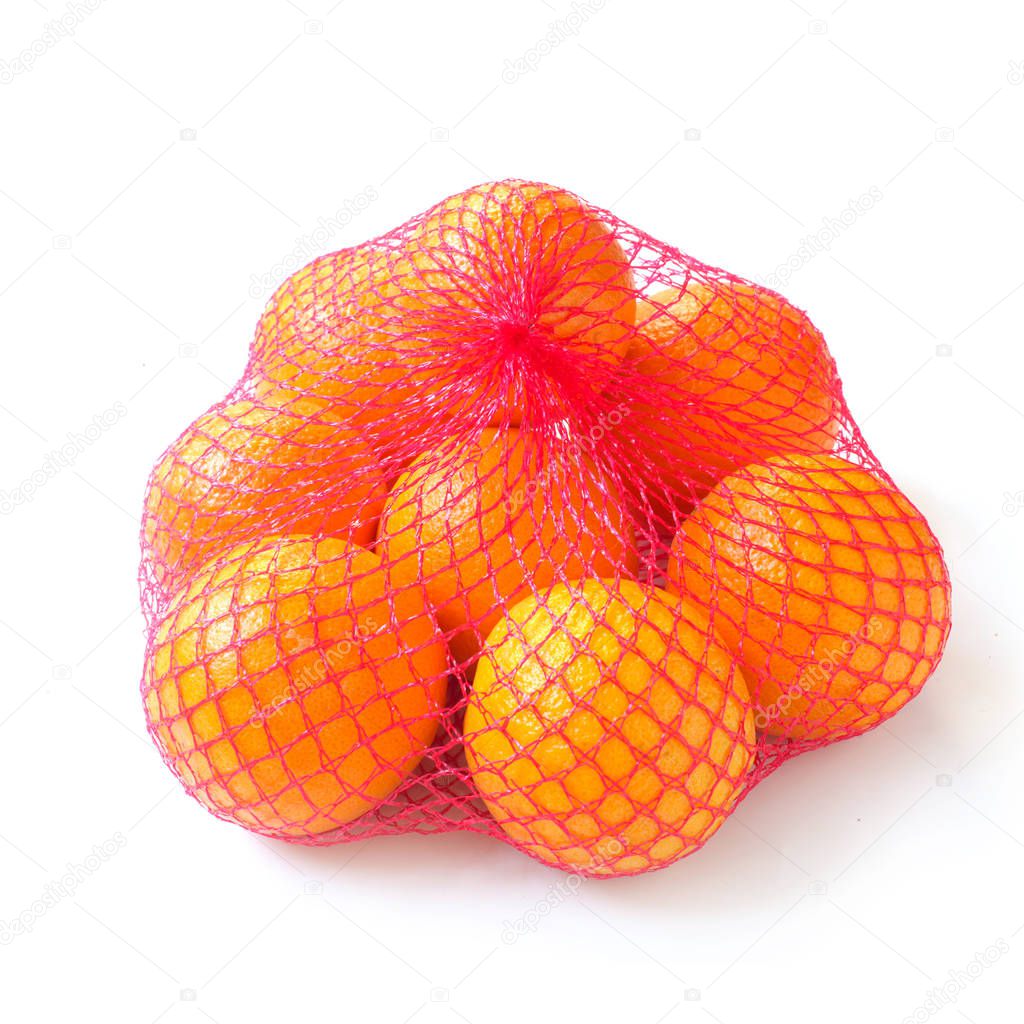 close-up shot of Oranges In Net Isolated On White
