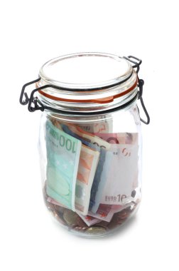 yakın çekim kavanoz para izole beyaz