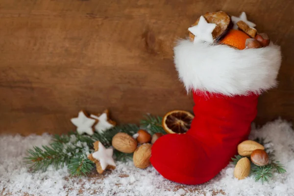 Weihnachtsmann Stiefel Auf Holzgrund — Stockfoto