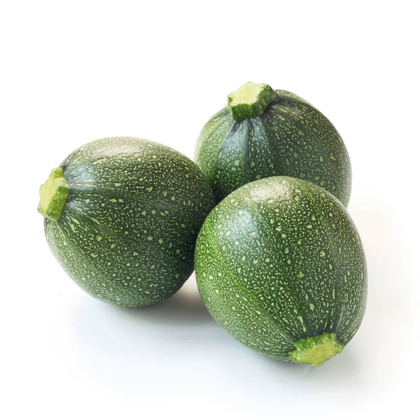 Groep Van Drie Ronde Verzadigde Groene Courgettes Geïsoleerd Witte Achtergrond — Stockfoto