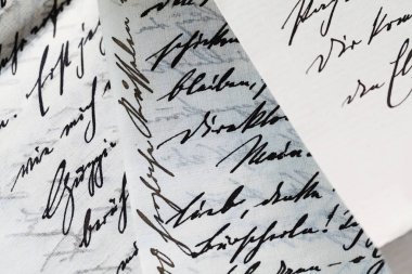 close-up shot of Black Ink Handwriting On White Paper clipart