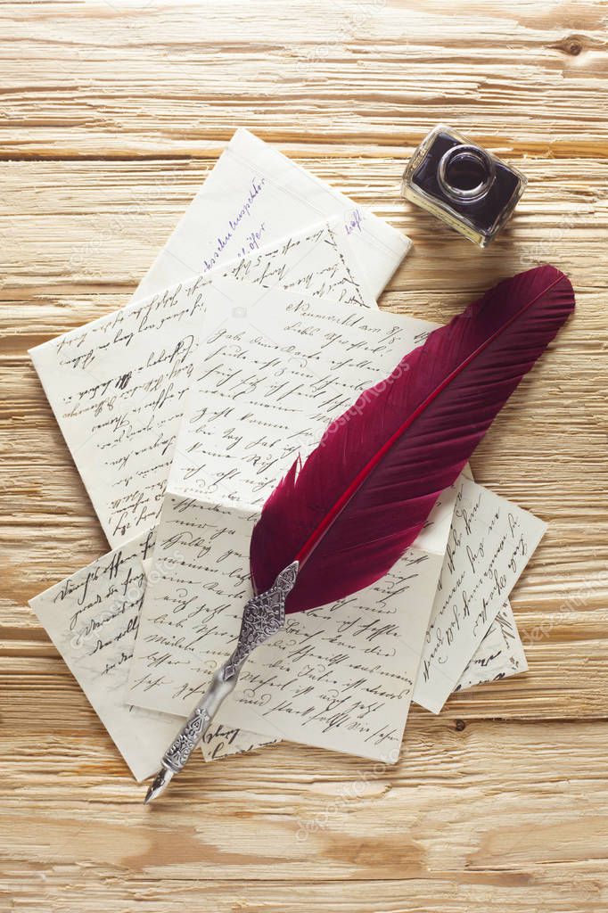 close-up shot of Handwritten Letters With Quill And Ink