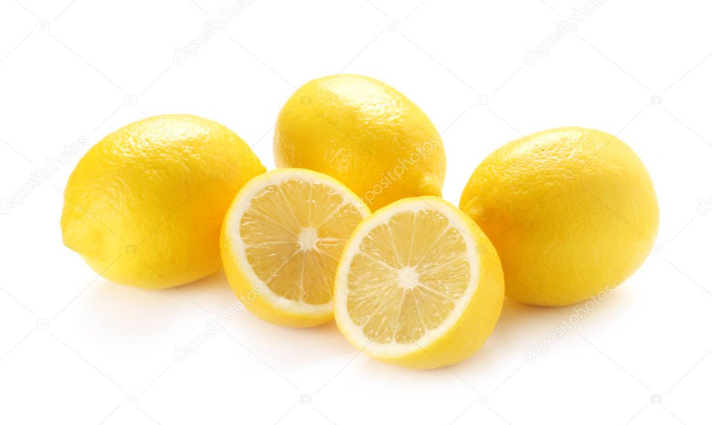 Whole And Halved Lemons Isolated On White