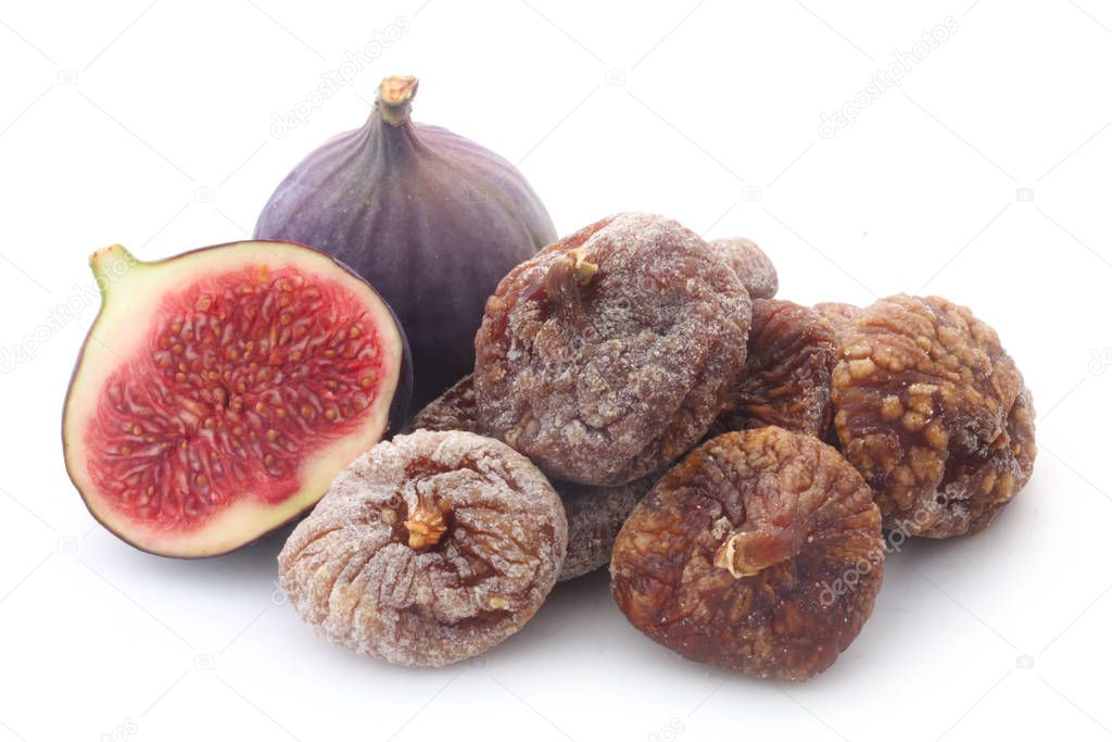 close-up shot of fresh and dried figs isolated on white