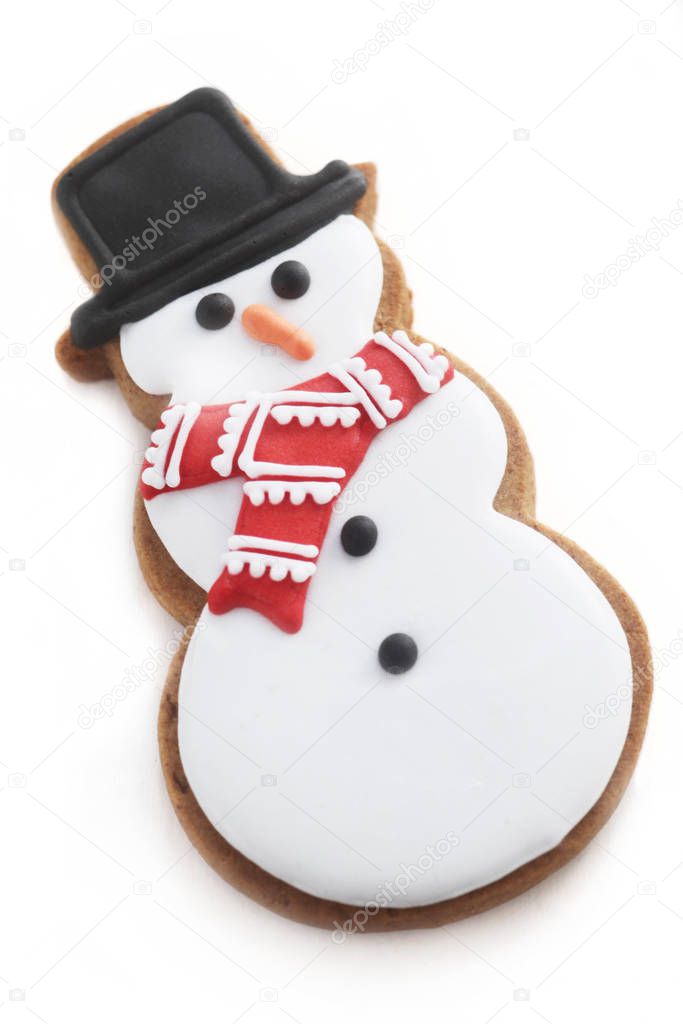 Snowman Shaped Christmas Biscuit Isolated Over White
