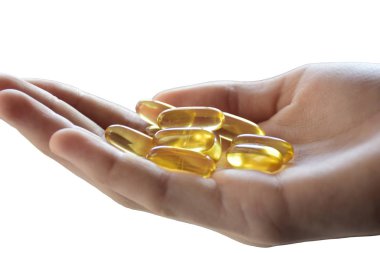 Beslenme takviyeleri. Sağlık desteği ve tedavi. Omega 3 'lü gerçekçi sarı jelatin kapsül. Omega-3 balık yağı kapsülleri. Biyolojik olarak aktif katkı maddeleri