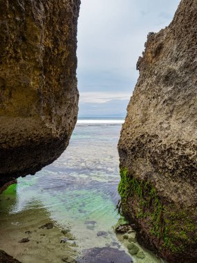 Uluwatu beautiful beach view Bali Indonesia with crystal clear w