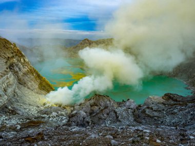 Moiunt Ijen Volcano view with sulfur an the toxic blue lake on J