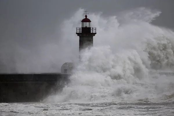 Old lighthouse during heavy storm — Stock Photo, Image