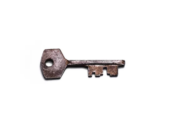 白い背景で隔離された単一の古いキー — ストック写真