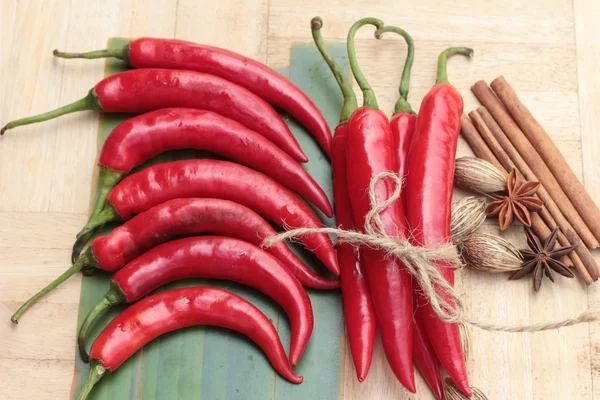 Fresh red hot chilli on wood background — Stock Photo, Image