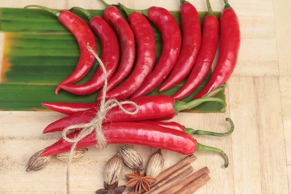Fresh red hot chilli on wood background — Stock Photo, Image