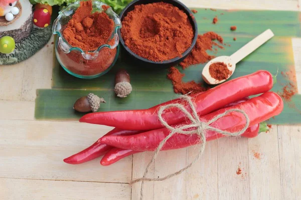 Spicy paprika powder hot peppers and fresh chili — Stock Photo, Image