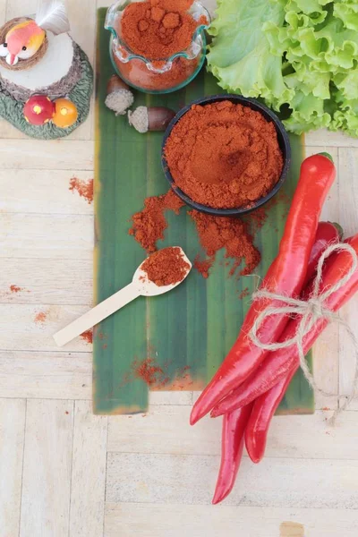 Spicy paprika powder hot peppers and fresh chili — Stock Photo, Image