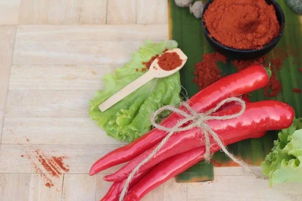 Spicy paprika powder hot peppers and fresh chili — Stock Photo, Image