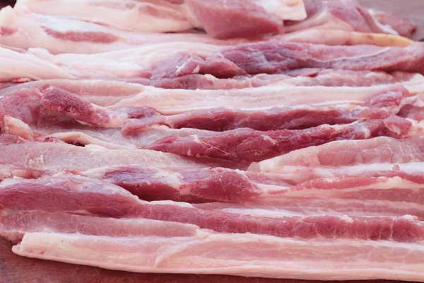 Cerdo crudo para cocinar en el mercado — Foto de Stock