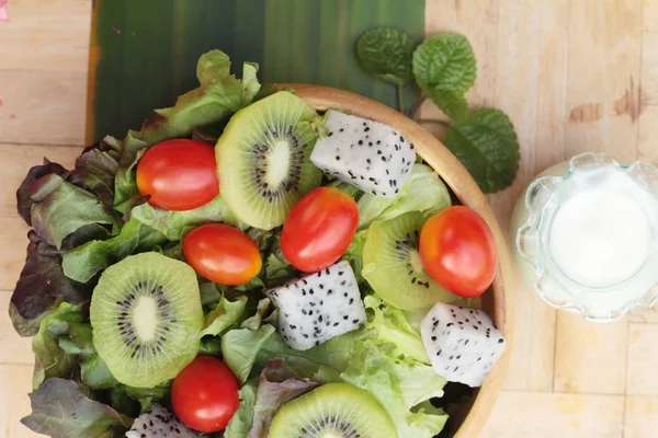 Kiwi salad and fresh vegetables for health
