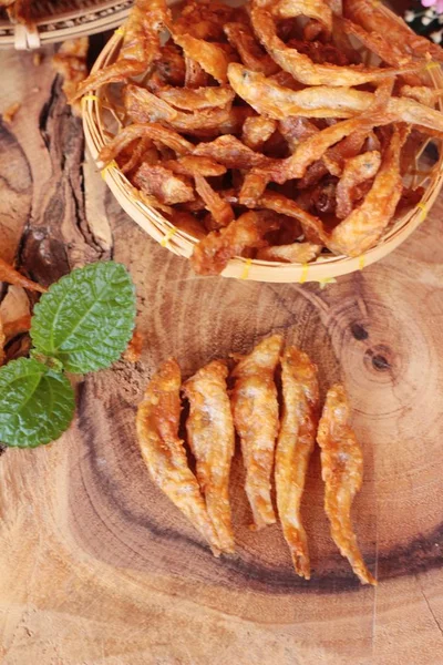 Fried fish is tasty on wood background — Stock Photo, Image