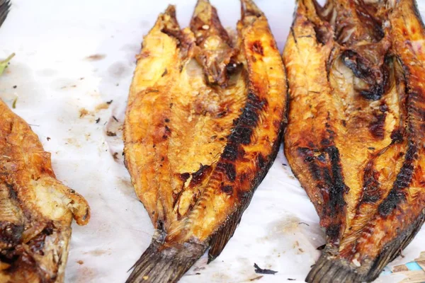 Grilled fish on the stove in market — Stock Photo, Image