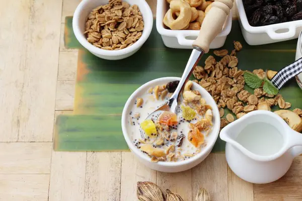 Granola cereal mix for health with milk — Stock Photo, Image