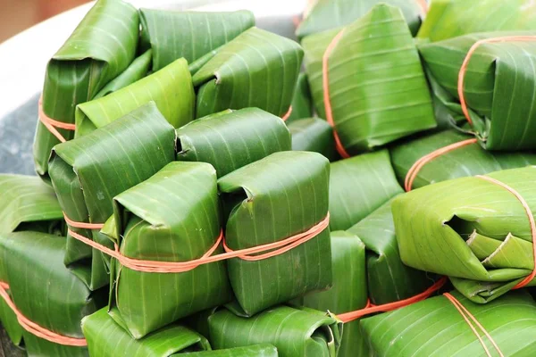 Sour pork wrapped in banana leaves delicious — Stock Photo, Image