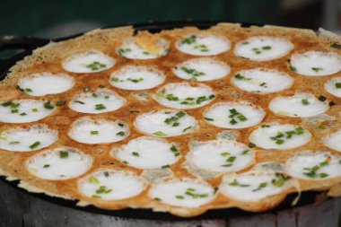 Hindistan cevizi sütü karıştırın şeker ve un, Tay tatlı