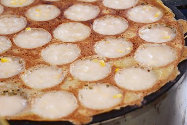 Hindistan cevizi sütü karıştırın şeker ve un, Tay tatlı