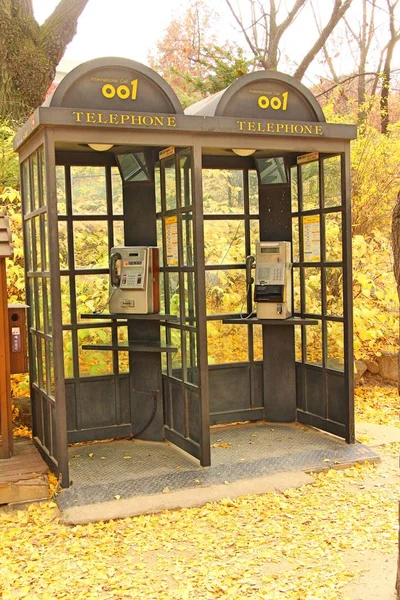 Public telephone booths in park South Korea — Stock Photo, Image